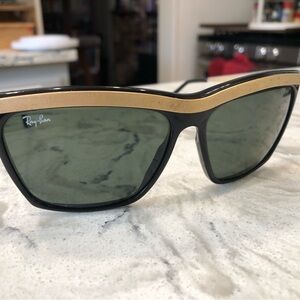 Ray-Ban Black and Gold Sunglasses with Sporty Design